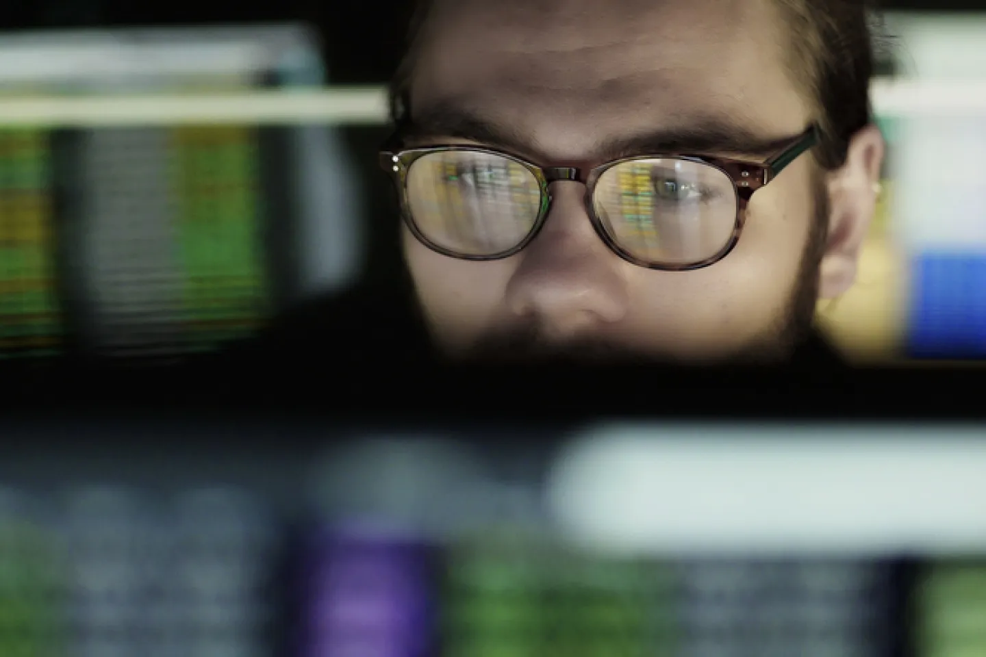 Man looking at Stock data