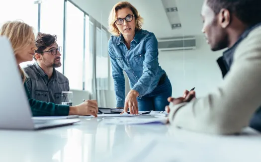 Businesswoman presenting to group